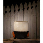 Mr. Albert Skully Halloween bucket displayed on a wooden shelf against a dark seasonal backdrop.