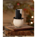 Vintage-inspired Mr. Snowman Christmas decoration displayed on wooden box
