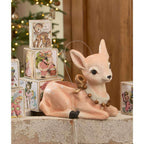 Vintage-inspired Christmas nesting blocks displayed with retro holiday deer decoration