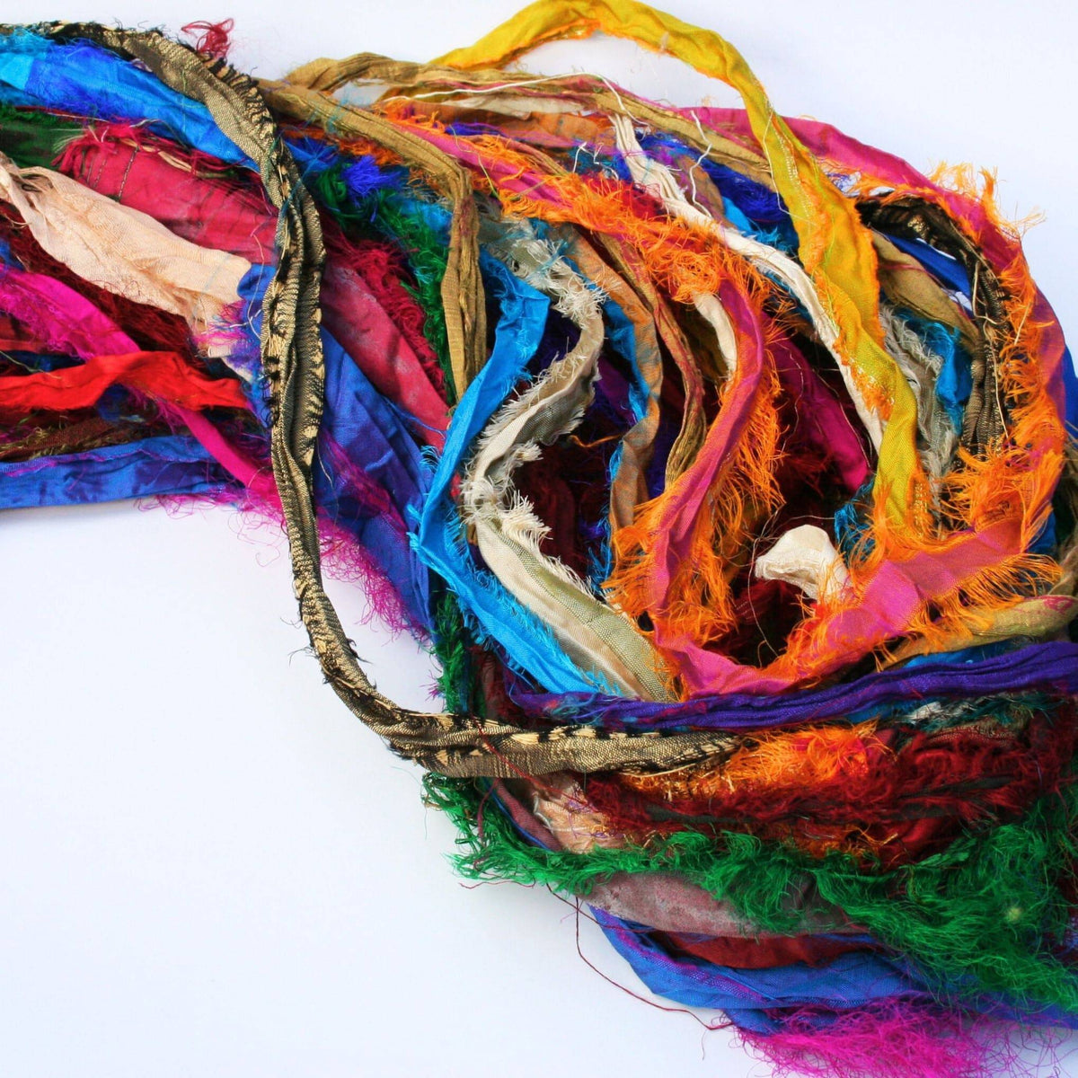 Colorful Tibet Jewels recycled sari silk ribbon yarn with vibrant frayed strands in jewel tones