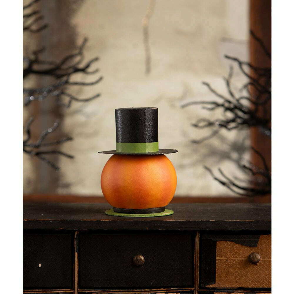 Rear view of the Smiling Pumpkin Container showing its orange pumpkin shape and removable top hat.