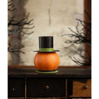 Rear view of the Smiling Pumpkin Container showing its orange pumpkin shape and removable top hat.