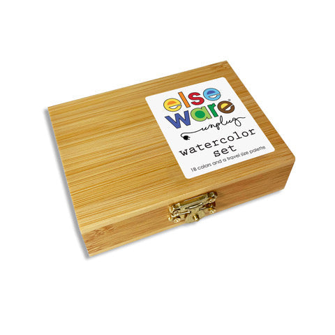 Closed bamboo watercolor set with illustrated label on the lid