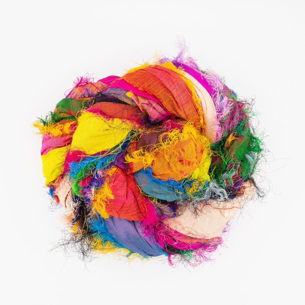 Tibet Jewels recycled sari silk ribbon gathered into a colorful ball with naturally frayed edges