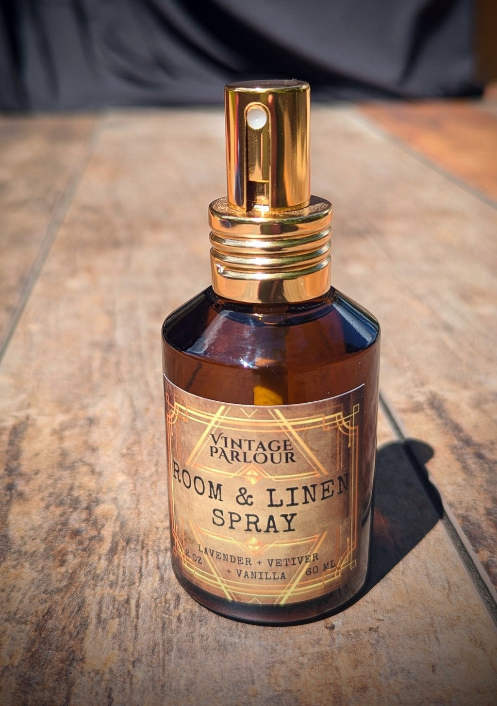 Lavender, vetiver and vanilla room and linen spray in an amber glass bottle