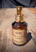 Lavender, vetiver and vanilla room and linen spray in an amber glass bottle