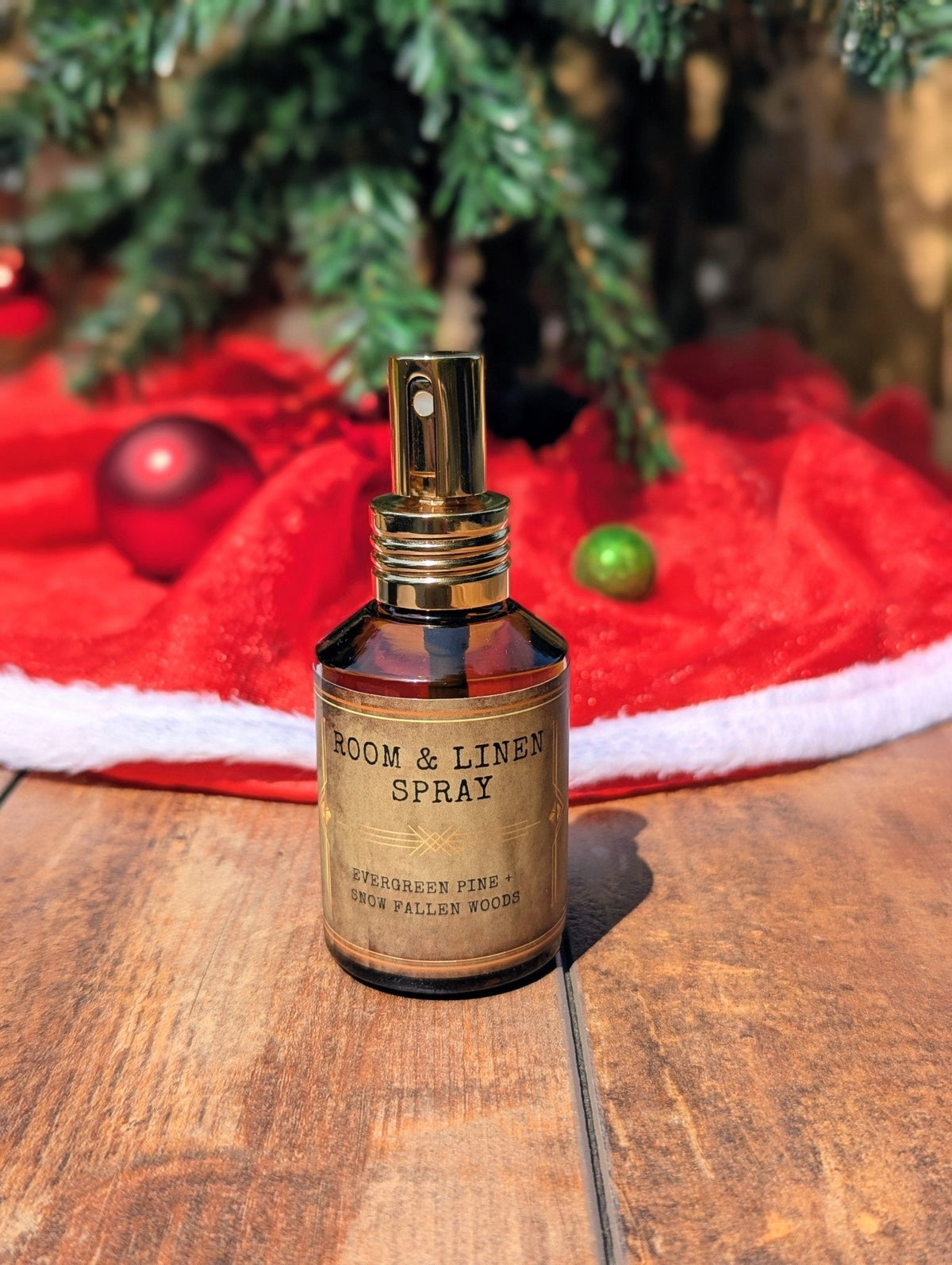 Evergreen pine and snow fallen woods room and linen spray with holiday greenery
